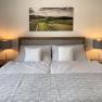 Box spring bed in bedroom 2, © Kay Haderer